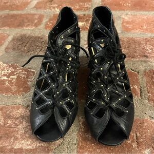 Dolce Vita Black Lace-Up Boots with Gold Accents